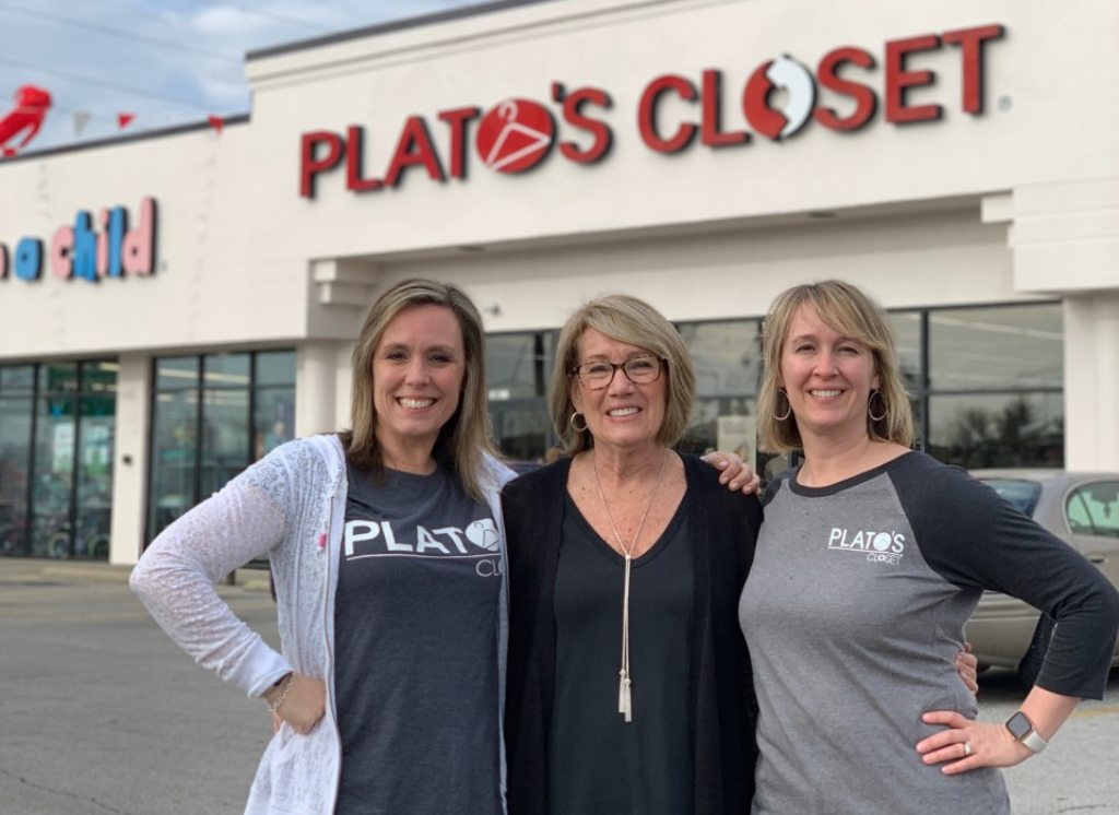 3 women in front of Plato's Closet store